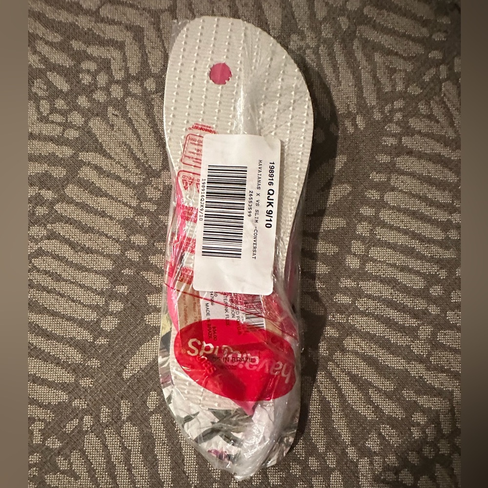 Slim Flip flops. Size 9-10.